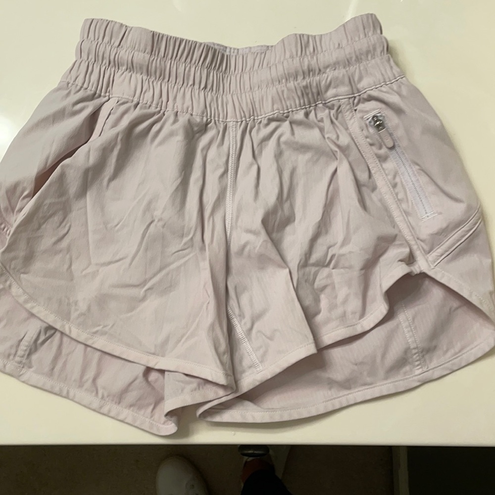 White lululemon tracker shorts 4” inseam size 4